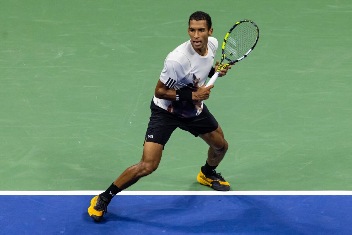 Sep 5, 2025; Flushing, NY, USA; Felix Auger-Aliassime of Canada in action against Jannik Sinner of Italy in the semifinal of the men’s singles at the US Open at Arthur Ashe Stadium in Billie Jean King National Tennis Center.