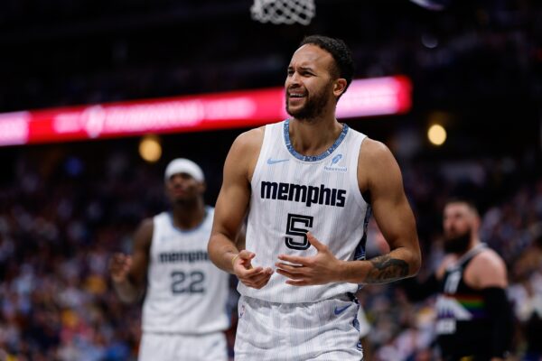 Memphis Grizzlies forward Kyle Anderson (5) reacts after a play in the second quarter against the Denver Nuggets at Ball Arena.