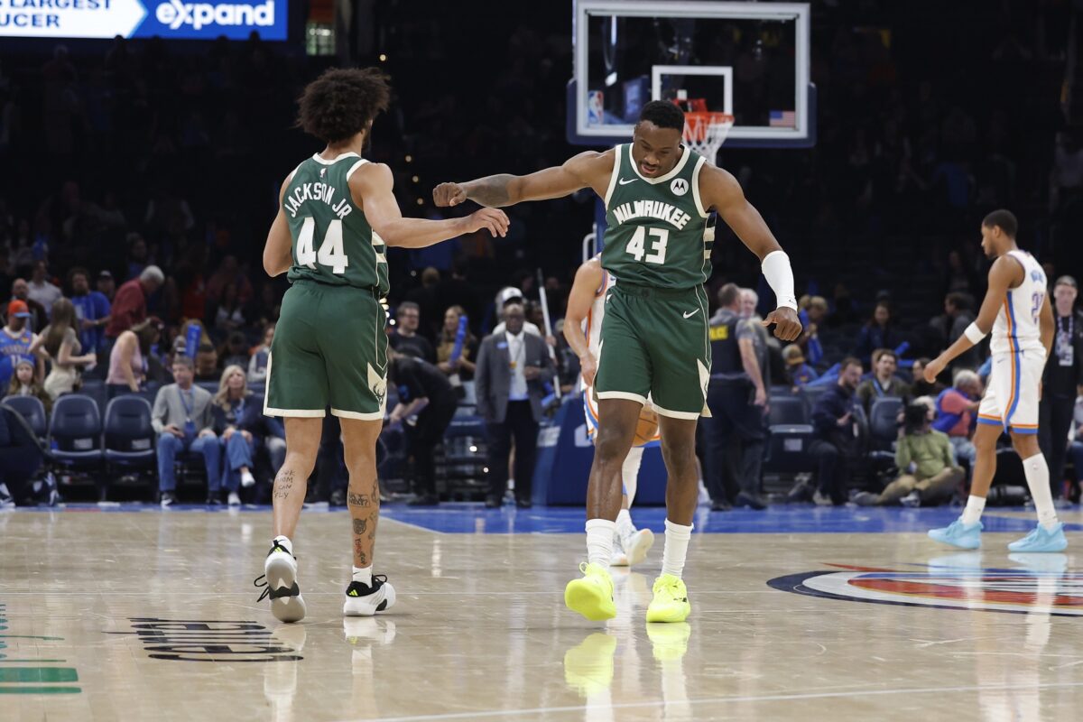 Milwaukee Bucks forward Thanasis Antetokounmpo (43) and Milwaukee Bucks guard Andre Jackson Jr. (44) celebrate after a play against the Oklahoma City Thunder during the second half at Paycom Center.