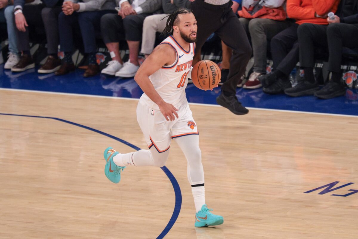 New York Knicks guard Jalen Brunson (11) dribbles up court against the Detroit Pistons during the first quarter at Madison Square Garden.