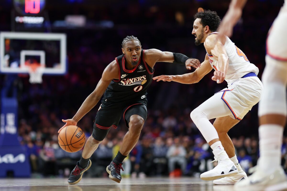Philadelphia 76ers guard Tyrese Maxey (0) drives against New York Knicks guard Landry Shamet (44) during the second half at Xfinity Mobile Arena.