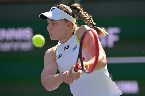 Mar 15, 2026; Indian Wells, CA, USA; Elena Rybakina (KAZ) hits a shot against Aryna Sabalenka (BEL) during the women&Otilde;s final in the BNP Paribas Open at the Indian Wells Tennis Garden.