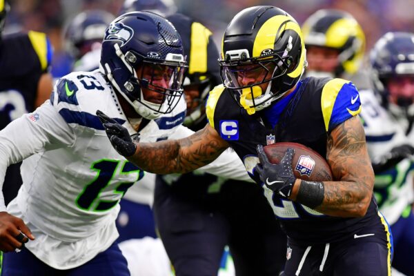 Los Angeles Rams running back Kyren Williams (23) against Seattle Seahawks linebacker Ernest Jones IV (13) during the second half at SoFi Stadium.