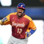 MIAMI, FLORIDA - MARCH 12: Salvador Perez #13 of Venezuela celebrates while rounding the bases after Anthony Santander hit a three run home run in the first inning against Puerto Rico at loanDepot park on March 12, 2023 in Miami, Florida