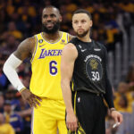 SAN FRANCISCO, CALIFORNIA - MAY 02: LeBron James #6 of the Los Angeles Lakers stands next to Stephen Curry #30 of the Golden State Warriors during the second quarter in game one of the Western Conference Semifinal Playoffs at Chase Center on May 02, 2023 in San Francisco, California.