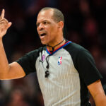 CHARLOTTE, NORTH CAROLINA - FEBRUARY 25: Referee Eric Lewis #42 during the game between the Charlotte Hornets and the Miami Heat at Spectrum Center on February 25, 2023 in Charlotte, North Carolina.