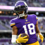MINNEAPOLIS, MINNESOTA - DECEMBER 17: Justin Jefferson #18 of the Minnesota Vikings warms up prior to a game against the Indianapolis Colts at U.S. Bank Stadium on December 17, 2022 in Minneapolis, Minnesota