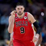 INDIANAPOLIS, INDIANA - FEBRUARY 15: Nikola Vucevic #9 of the Chicago Bulls reacts after making a shot in the fourth quarter against the Indiana Pacers at Gainbridge Fieldhouse on February 15, 2023 in Indianapolis, Indiana.