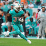 MIAMI GARDENS, FL - JANUARY 08:Miami Dolphins running back Raheem Mostert (31) runs after a catch during the game between the New York Jets and the Miami Dolphins on Sunday, January 8, 2023 at Hard Rock Stadium, Miami Gardens, Fla