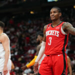 HOUSTON, TEXAS - APRIL 04: Kevin Porter Jr. #3 of the Houston Rockets reacts after a play during the game against the Denver Nuggets at Toyota Center on April 04, 2023 in Houston, Texas.