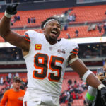 CLEVELAND, OH - OCTOBER 15: Cleveland Browns defensive end Myles Garrett (95) celebrates as he leaves the field following the National Football League game between the San Francisco 49ers and Cleveland Browns on October 15, 2023, at Cleveland Browns Stadium in Cleveland, OH.