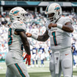 Miami Dolphins - NFL - Tua Tagovailoa and De'Von Achane