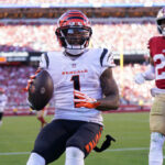 SANTA CLARA, CALIFORNIA - OCTOBER 29: Ja'Marr Chase #1 of the Cincinnati Bengals catches a pass for a touchdown against Isaiah Oliver #26 of the San Francisco 49ers during the third quarter at Levi's Stadium on October 29, 2023 in Santa Clara, California.