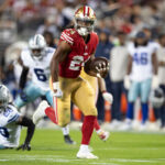 SANTA CLARA, CA - OCTOBER 8: Jordan Mason #24 of the San Francisco 49ers rushes for a 26-yard touchdown during game against the Dallas Cowboys at Levi's Stadium on October 8, 2023 in Santa Clara, California. The 49ers defeated the Cowboys 42-10.