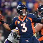 DENVER, COLORADO - NOVEMBER 19: Quarterback Russell Wilson #3 of the Denver Broncos throws a deep pass during the second quarter of the NFL game against the Minnesota Vikings at Empower Field At Mile High on November 19, 2023 in Denver, Colorado.