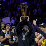 LAS VEGAS, NEVADA - DECEMBER 09: LeBron James #23 of the Los Angeles Lakers hoists the trophy with his teammates after winning the championship game of the inaugural NBA In-Season Tournament at T-Mobile Arena on December 09, 2023 in Las Vegas, Nevada.