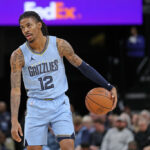 MEMPHIS, TENNESSEE - JANUARY 02: Ja Morant #12 of the Memphis Grizzlies handles the ball during the game against the San Antonio Spurs at FedExForum on January 02, 2024 in Memphis, Tennessee.