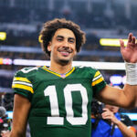 DALLAS, TX - JANUARY 14: Jordan Love #10 of the Green Bay Packers celebrates after defeating the Dallas Cowboys during the NFC Wild Card playoff game at AT&T Stadium on January 14, 2024 in Dallas, Texas.