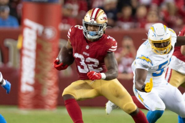 SANTA CLARA, CA - AUGUST 25: Tyrion Davis-Price #32 of the San Francisco 49ers rushes during the game against the Los Angeles Chargers at Levi's Stadium on August 25, 2023 in Santa Clara, California. The Chargers defeated the 49ers 23-12.