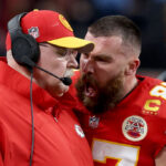 LAS VEGAS, NEVADA - FEBRUARY 11: Travis Kelce #87 of the Kansas City Chiefs reacts at Head coach Andy Reid in the first half against the San Francisco 49ers during Super Bowl LVIII at Allegiant Stadium on February 11, 2024 in Las Vegas, Nevada