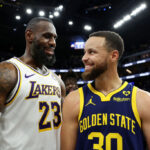 SAN FRANCISCO, CALIFORNIA - JANUARY 27: LeBron James #23 of the Los Angeles Lakers and Stephen Curry #30 of the Golden State Warriors talk to each other after the Lakers beat the Warriors in double overtime at Chase Center on January 27, 2024 in San Francisco, California.