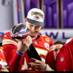 LAS VEGAS, NEVADA - FEBRUARY 11: Patrick Mahomes #15 of the Kansas City Chiefs celebrates with the Vince Lombardi Trophy following the NFL Super Bowl 58 football game between the San Francisco 49ers and the Kansas City Chiefs at Allegiant Stadium on February 11, 2024 in Las Vegas, Nevada.