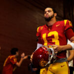 LOS ANGELES, CALIFORNIA - NOVEMBER 18: Caleb Williams #13 of the USC Trojans walks to the field for team entrances prior to a game against the UCLA Bruins at United Airlines Field at the Los Angeles Memorial Coliseum on November 18, 2023 in Los Angeles, California