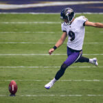 BALTIMORE, MD - SEPTEMBER 13: Justin Tucker #9 of the Baltimore Ravens takes the opening kick-off against the Cleveland Browns at M&T Bank Stadium on September 13, 2020 in Baltimore, Maryland