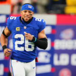 EAST RUTHERFORD, NJ - JANUARY 07: Saquon Barkley #26 of the New York Giants takes the field before kickoff against the Philadelphia Eagles at MetLife Stadium on January 7, 2024 in East Rutherford, New Jersey