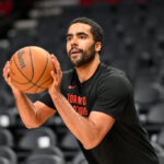 PORTLAND, OREGON - MARCH 09: Jontay Porter #34 of the Toronto Raptors warms up before the game against the Portland Trail Blazers at the Moda Center on March 09, 2024 in Portland, Oregon.