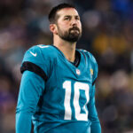 JACKSONVILLE, FL - DECEMBER 17: Brandon McManus #10 of the Jacksonville Jaguars looks on from the field during an NFL football game against the Baltimore Ravens at EverBank Stadium on December 17, 2023 in Jacksonville, Florida.