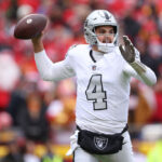 KANSAS CITY, MISSOURI - DECEMBER 25: Aidan O'Connell #4 of the Las Vegas Raiders throws a pass during the first quarter against the Kansas City Chiefs at GEHA Field at Arrowhead Stadium on December 25, 2023 in Kansas City, Missouri.