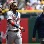 PITTSBURGH, PENNSYLVANIA - MAY 26: Ronald Acuña Jr. #13 of the Atlanta Braves walks off the field with trainers after an apparent injury in the first inning during the game against the Pittsburgh Pirates at PNC Park on May 26, 2024 in Pittsburgh, Pennsylvania