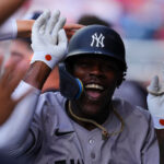 PHILADELPHIA, PENNSYLVANIA - JULY 29: Jazz Chisholm Jr. #13 of the New York Yankees celebrates with teammates after hitting a solo home run in the top of the second inning against the Philadelphia Phillies at Citizens Bank Park on July 29, 2024 in Philadelphia, Pennsylvania
