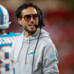 TAMPA, FLORIDA - AUGUST 23: Mike McDaniel head coach of the Miami Dolphins looks on during a preseason game against the Tampa Bay Buccaneers at Raymond James Stadium on August 23, 2024 in Tampa, Florida