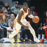 Apr 5, 2023; Atlanta, Georgia, USA; Atlanta Hawks forward AJ Griffin (14) dribbles against the Washington Wizards in the first half at State Farm Arena.