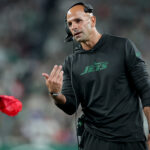 Sep 19, 2024; East Rutherford, New Jersey, USA; New York Jets head coach Robert Saleh throws a challenge flag during the second quarter against the New England Patriots at MetLife Stadium.