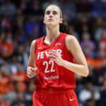 Sep 25, 2024; Uncasville, Connecticut, USA; Indiana Fever guard Caitlin Clark (22) reacts during the first half against the Connecticut Sun during game two of the first round of the 2024 WNBA Playoffs at Mohegan Sun Arena.
