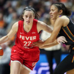 Sep 25, 2024; Uncasville, Connecticut, USA; Indiana Fever guard Caitlin Clark (22) dribbles the ball during the first half against the Connecticut Sun during game two of the first round of the 2024 WNBA Playoffs at Mohegan Sun Arena. Mandatory Credit: Paul Rutherford-Imagn Images