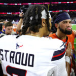 HOUSTON, TEXAS - SEPTEMBER 15: C.J. Stroud #7 of the Houston Texans shakes hands with Caleb Williams #18 of the Chicago Bears following the game at NRG Stadium on September 15, 2024 in Houston, Texas.