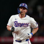 ARLINGTON, TEXAS - AUGUST 19: Corey Seager #5 of the Texas Rangers runs the bases after hitting a solo home run during the first inning against the Pittsburgh Pirates at Globe Life Field on August 19, 2024 in Arlington, Texas