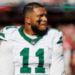 SANTA CLARA, CA - SEPTEMBER 9: Linebacker Jermaine Johnson #11 of the New York Jets stands on the sidelines during the national anthem prior an NFL football game against the San Francisco 49ers, at Levi's Stadium on September 9, 2024 in Santa Clara, California