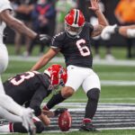 Sep 29, 2024; Atlanta, Georgia, USA; Atlanta Falcons place kicker Younghoe Koo (6) kicks the game winning field goal against the New Orleans Saints during the fourth quarter at Mercedes-Benz Stadium. Mandatory Credit: Dale Zanine-Imagn Images