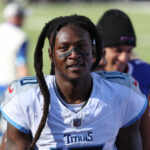 ORCHARD PARK, NEW YORK - OCTOBER 20: DeAndre Hopkins #10 of the Tennessee Titans walks off the field during halftime against the Buffalo Bills at Highmark Stadium on October 20, 2024 in Orchard Park, New York.