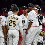 Jul 9, 2019; Cleveland, OH, USA; New York Yankees pitcher CC Sabathia visits American League pitcher Aroldis Chapman (54) of the New York Yankees on the mound during the ninth inning in the 2019 MLB All Star Game at Progressive Field. Mandatory Credit: Ken Blaze-USA TODAY Sports