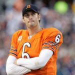 Jay Cutler stands on the sideline during a game against the Packers on Sept. 25, 2011.