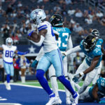 Aug 12, 2023; Arlington, Texas, USA; Dallas Cowboys wide receiver John Stephens Jr. (49) scores a touchdown during the second half against the Jacksonville Jaguars at AT&T Stadium. Mandatory Credit: Kevin Jairaj-USA TODAY Sports