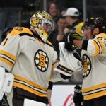 Nov 2, 2023; Boston, Massachusetts, USA; Boston Bruins left wing Brad Marchand (63) celebrates with goaltender Jeremy Swayman (1) after an overtime win against the Toronto Maple Leafs at the TD Garden. Mandatory Credit: Brian Fluharty-USA TODAY Sports