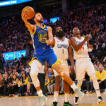 Nov 30, 2023; NBA; San Francisco, California, USA; NBA; Golden State Warriors guard Stephen Curry (30) scores against Los Angeles Clippers guard James Harden (1), guard Terance Mann (14) during the fourth quarter at Chase Center.