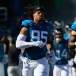 Jacksonville Jaguars defensive end Roy Robertson-Harris (95) runs onto the field before a regular season NFL football matchup Sunday, Dec. 31, 2023 at EverBank Stadium in Jacksonville, Fla. The Jacksonville Jaguars blanked the Carolina Panthers 26-0. [Corey Perrine/Florida Times-Union]